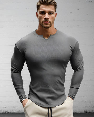 Camiseta técnica de punto acanalado de algodón con cuello en V y manga larga