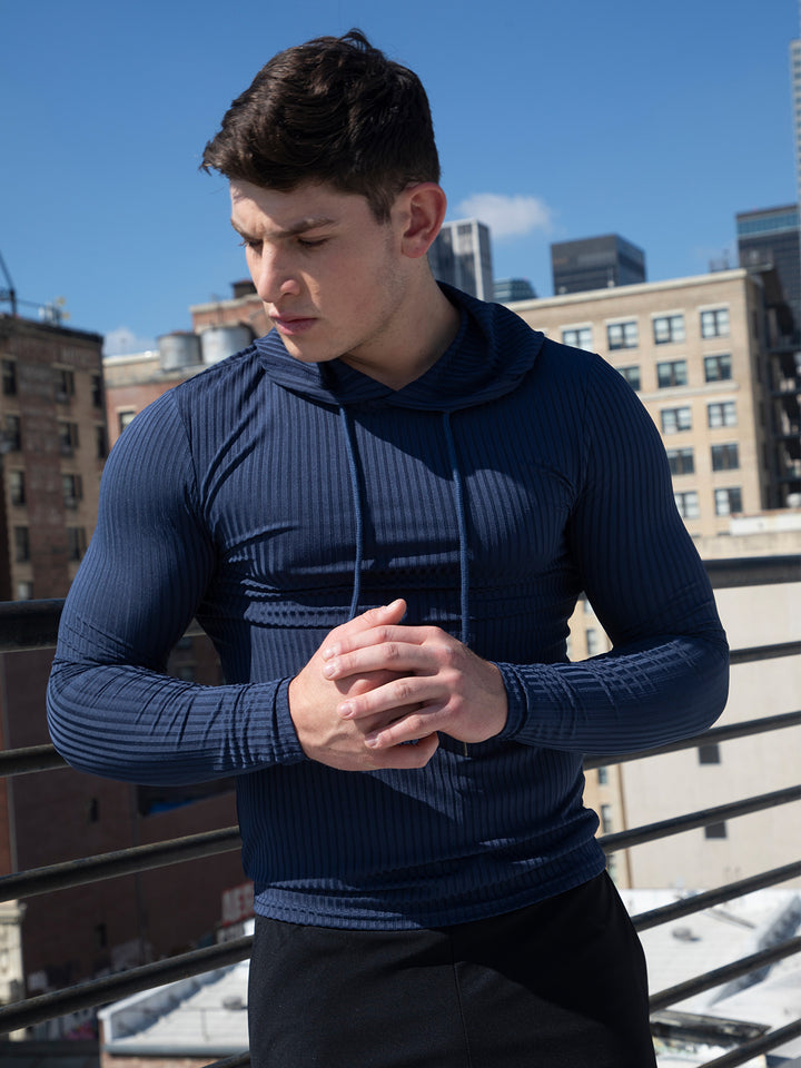 Jersey con capucha y capa base de canalé elástico