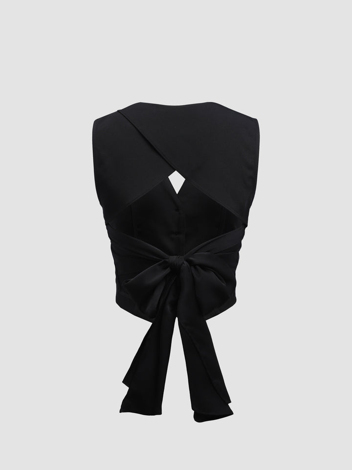 Gilet élégant dos nu avec nœud papillon papillon au dos