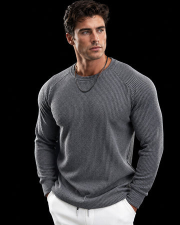 Pull-over à manches longues avec découpe à l'épaule et motif serpent