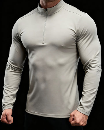 Top deportivo de manga larga tejido para hombre con media cremallera