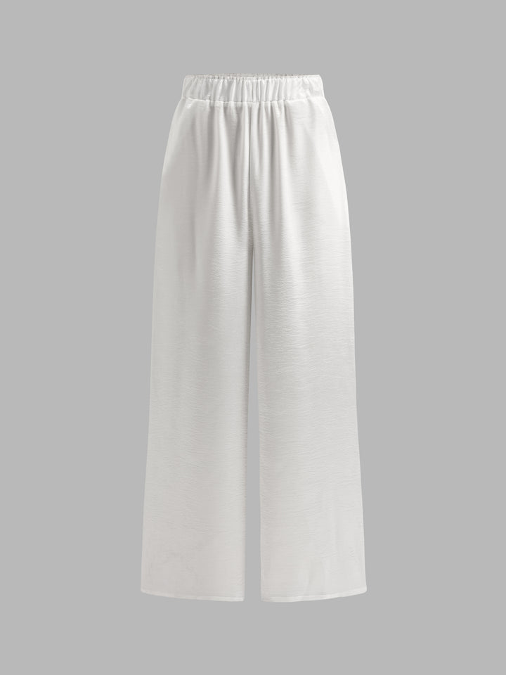 Pantalones anchos con cinturilla elástica de satén texturizado