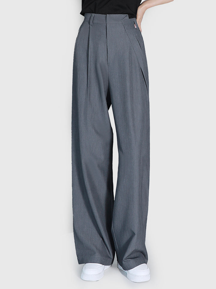 Pantalones de traje anchos con cintura irregular 