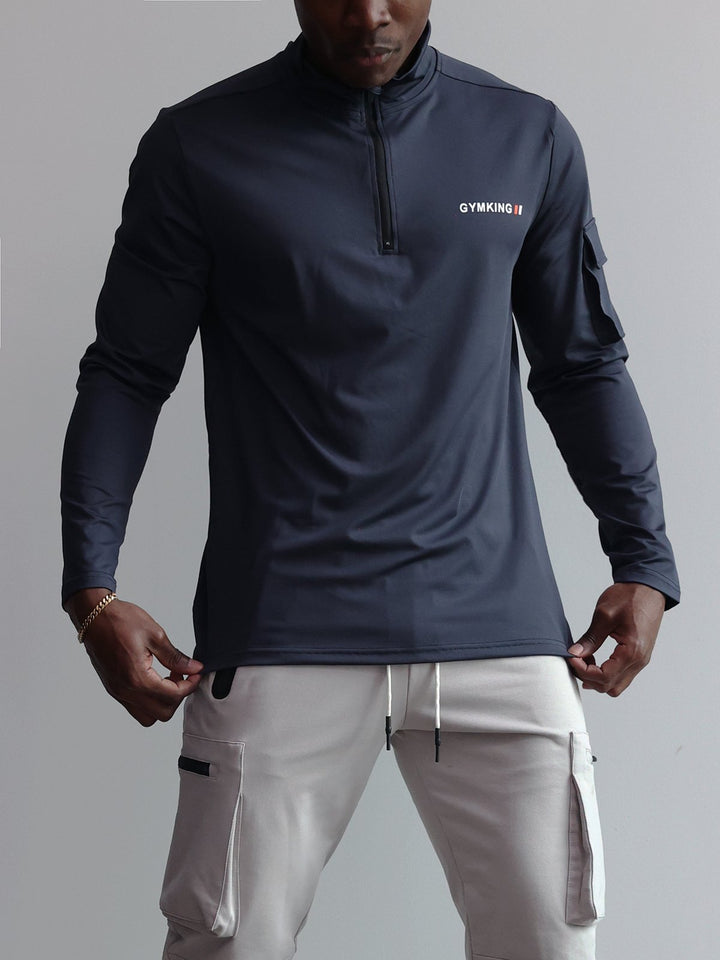 Camisa de manga larga con cremallera 1/4 y bolsillo cargo